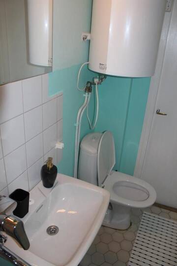 Фото номера Бюджетный трехместный номер Хостелы Hotel Ilomantsi North Star г. Иломантси 3