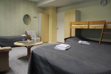 Фото номера Семейный номер с общей ванной комнатой Хостелы Hotel Ilomantsi North Star г. Иломантси 7