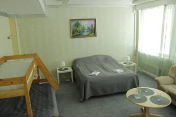 Фото номера Семейный номер с общей ванной комнатой Хостелы Hotel Ilomantsi North Star г. Иломантси 5