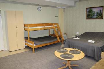 Фото номера Семейный номер с общей ванной комнатой Хостелы Hotel Ilomantsi North Star г. Иломантси 8