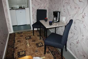 Фото номера Улучшенный номер-студио Хостелы Hotel Ilomantsi North Star г. Иломантси 7